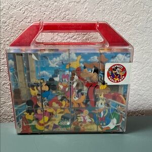 Vintage Clementoni "Mickey's World Tour" block puzzle set in a clear case